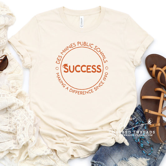 2024 Making a Difference DMPS Success Short Sleeve Shirt